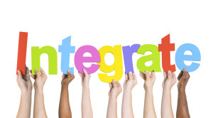 Diverse Hands Holding the Word Integrate